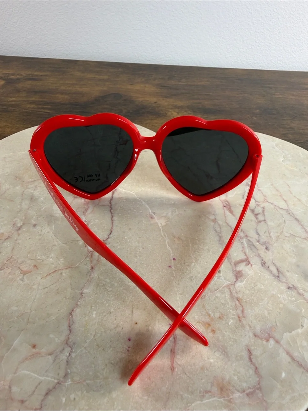 Red Heart-Shaped Sunglasses with Black Lenses